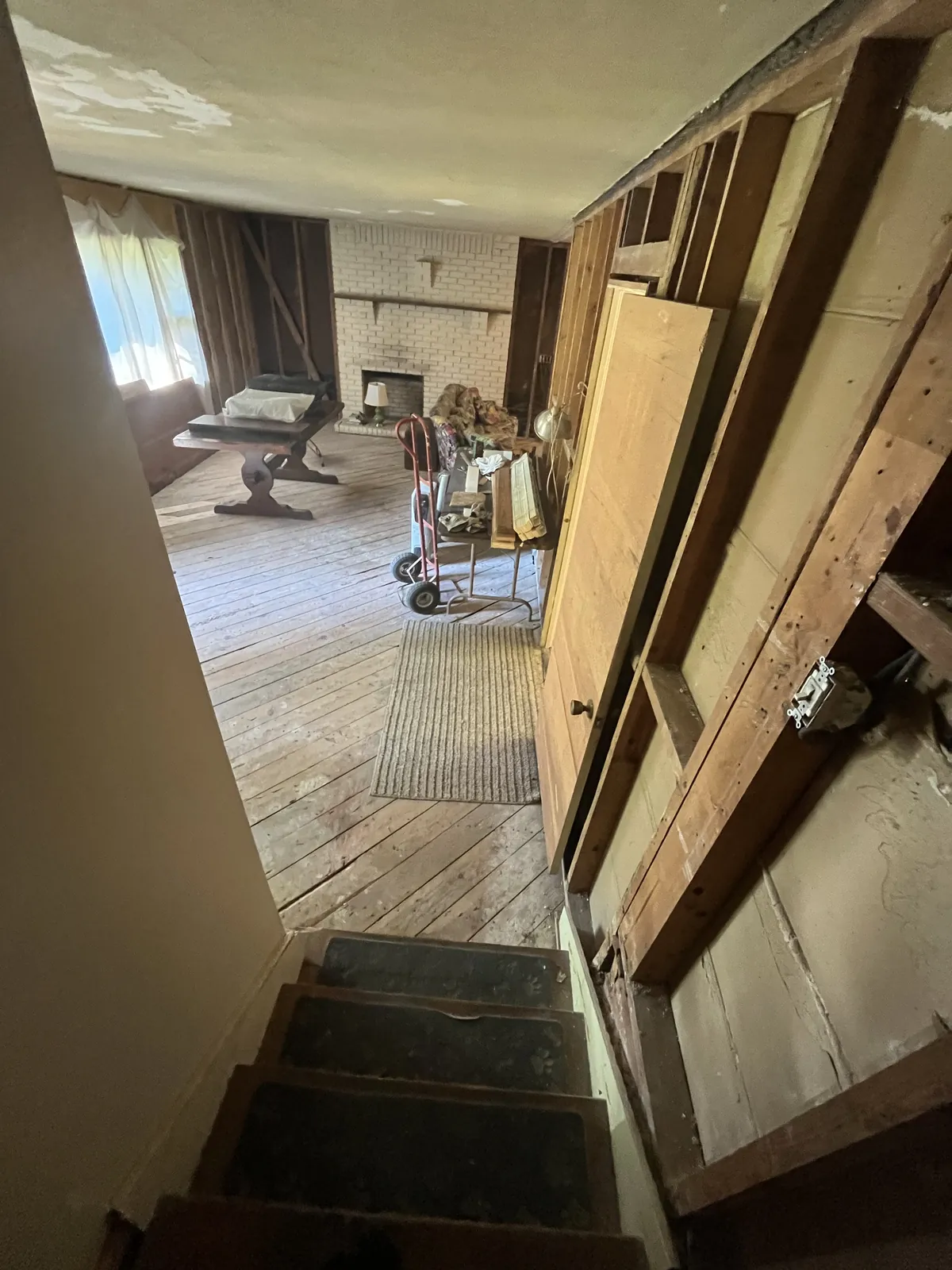 A West Columbia property as found: walls opened to the studs